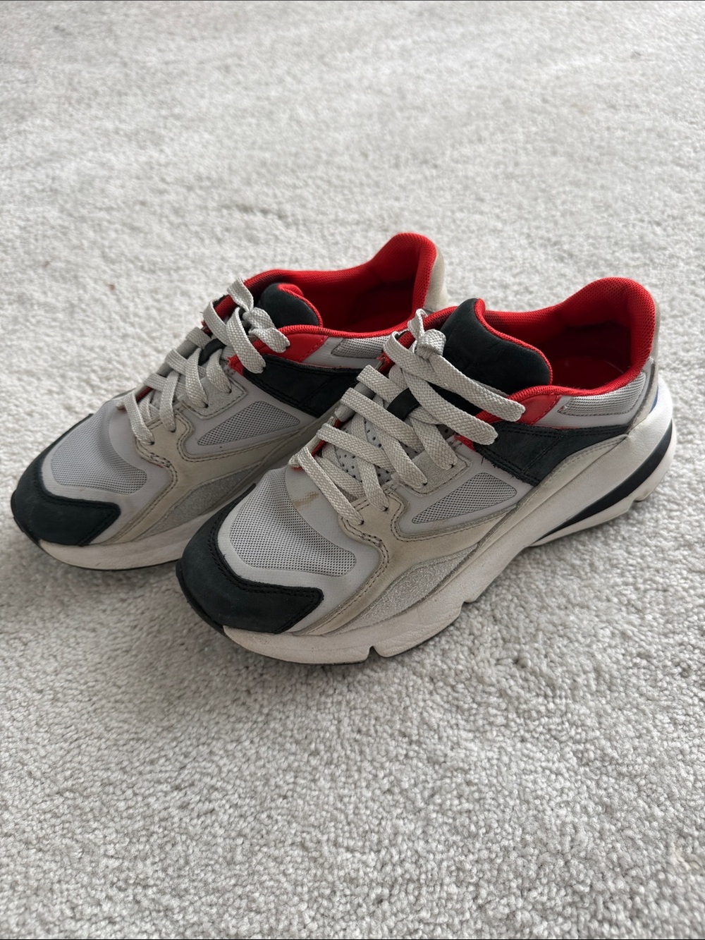 Under Armour Kids White and Black Sneakers with Red Lining